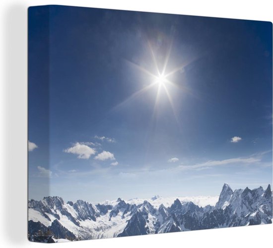 Canvas Schilderij Prachtige felle zon boven de berg de Mont Blanc - 120x90 cm - Wanddecoratie