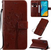 Voor Huawei Enjoy 10e Tree & Cat Pattern Pressed Printing Horizontale Flip PU Leather Case met Houder & Kaartsleuven & Portemonnee & Lanyard (Bruin)