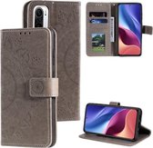 Voor Xiaomi Redmi K40 Totem Bloem Reliëf Horizontale Flip TPU + PU lederen tas met houder & kaartsleuven & portemonnee (grijs)