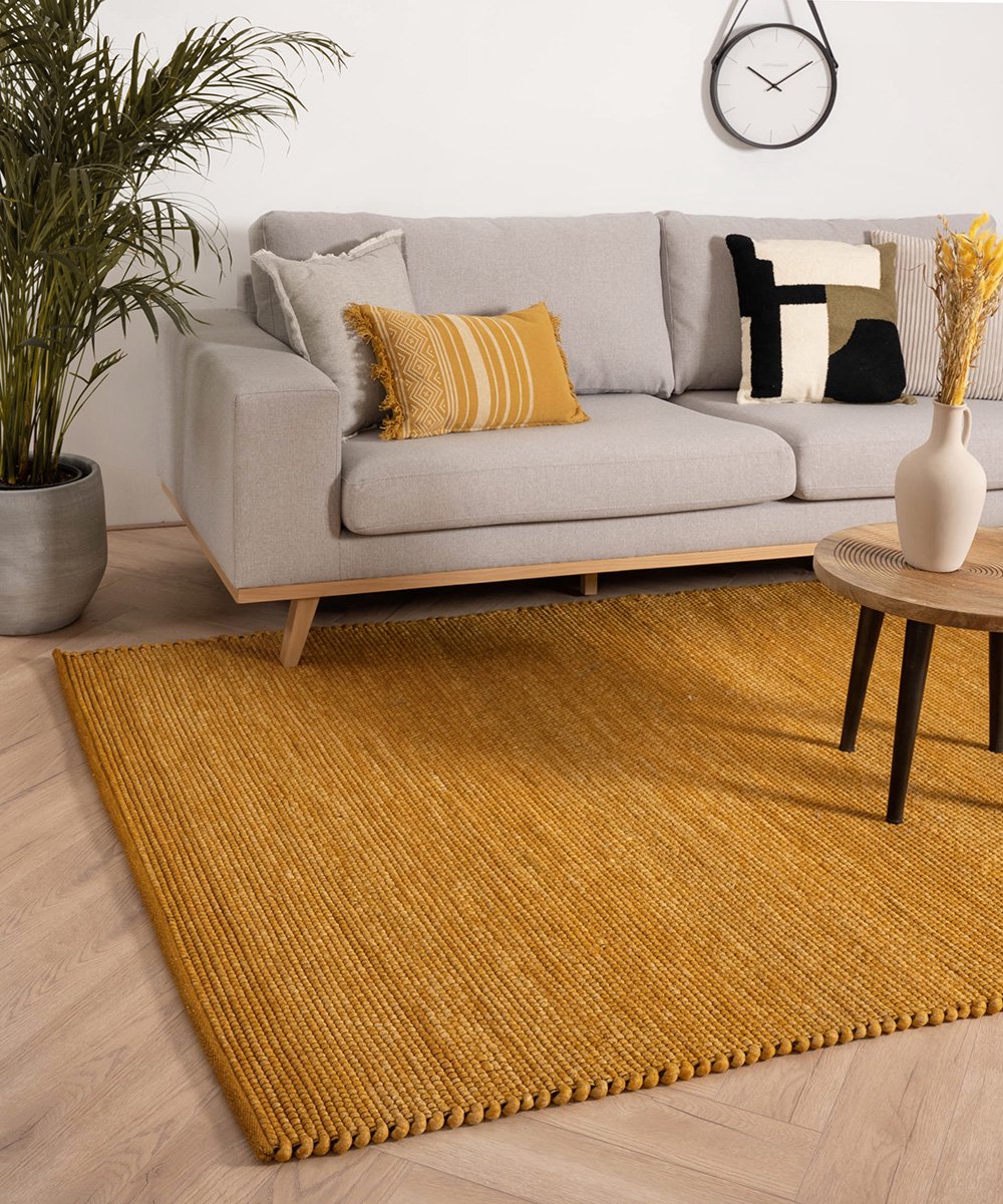 Wollen vloerkleed - Lett okergeel 60x120