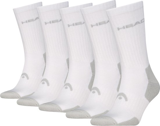 Cinq chaussettes de sport blanches Head avec renforts gris au talon et aux orteils, et le logo Head sur la tige.