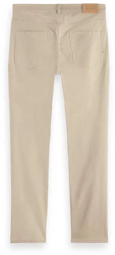 Beige corduroy broek, achterkant, met label 'Scotch & Soda'.