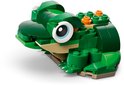 Groene LEGO-kikker met grote ogen, bruine buik en oranje stippen op de rug.