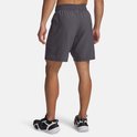 Achterkant man in donkergrijze sportbroek met elastische tailleband.