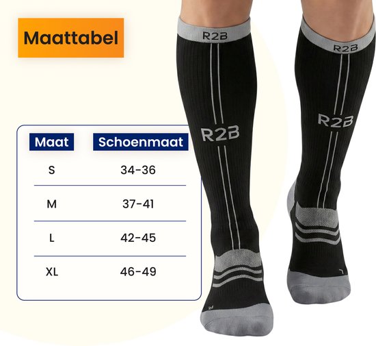 Twee zwarte R2B compressiekousen met grijze en witte accenten, naast een maattabel.