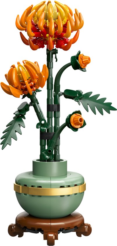 Chrysanthème Lego dans un vase vert avec une bande dorée et un socle marron. Les fleurs sont orange et rouges.