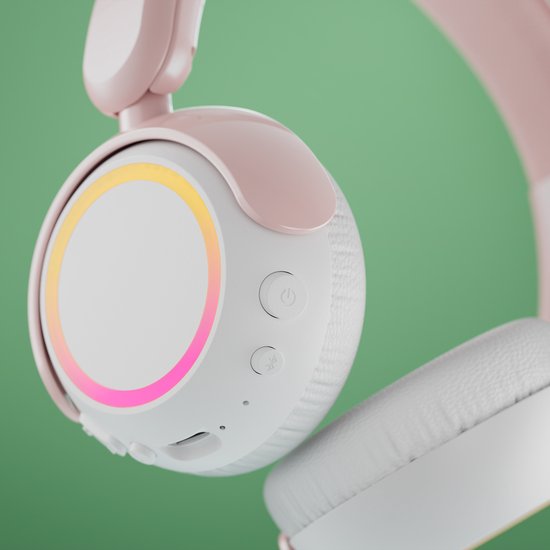 Close-up van de roze en witte Philips koptelefoon, met bedieningsknoppen en een oorschelp met verlichting.