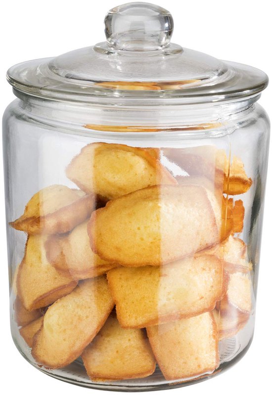 Grote glazen voorraadpot met deksel, gevuld met gouden madeleines.
