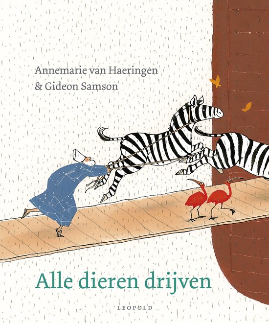 Een blauwe jas met sterren, getrokken door een zebra en twee rode vogels. De titel is 'Alle dieren drijven'.