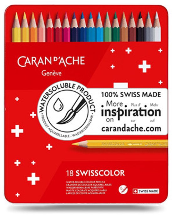 Doos met 18 Caran d'Ache Swisscolor wateroplosbare kleurpotloden, met de potloden zichtbaar bovenaan in regenboogkleuren.