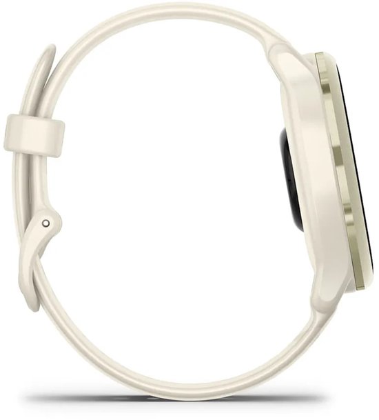 Zijaanzicht van een crèmekleurig sporthorloge met een goudkleurige rand en siliconen band.