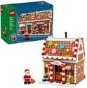 LEGO winters peperkoekhuis met kerstman minifiguur en LEGO doos.