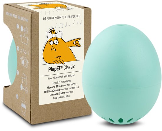 Turquoise ei-vormige kookwekker naast de verpakking met een tekening van een kuiken met muzieknoten.