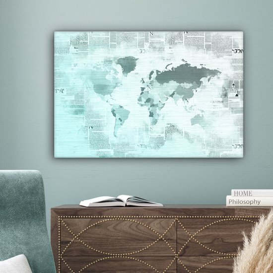 Wereldkaart aux couleurs bleu clair sur fond de papier journal 60x40 cm