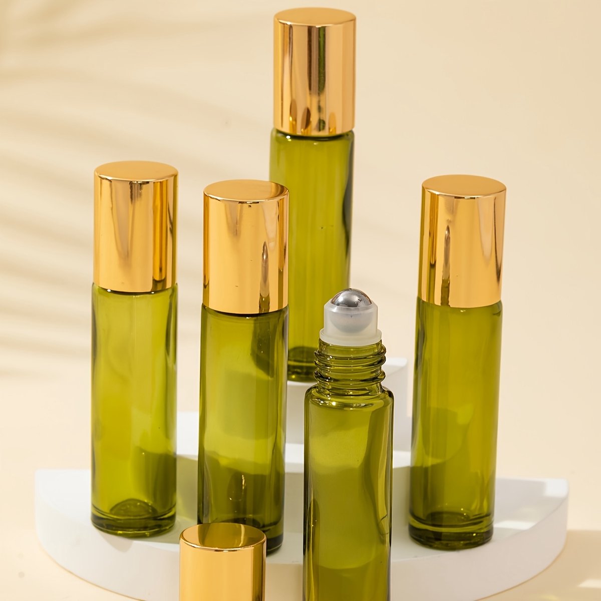 Dutchers® Rollerflesjes 5 stuks – 10ml Olijfgroen Glas – Hervulbare Doseerfles voor Essentiële Oliën & Parfum - Roll-on - RVS Bal - Parfumroller – Reisset Roller Bottles