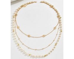 Goudkleurige layer ketting voor dames met parels en bloem details