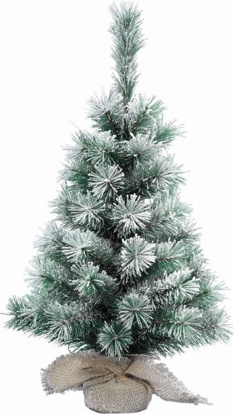 Natuurlijke groene kerstboom met sneeuw en rode bessen, bedekte