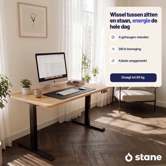 Eiken bureau met zwarte poten, met computer en kantoorspullen. Met kabelgoot en geheugenstanden.
