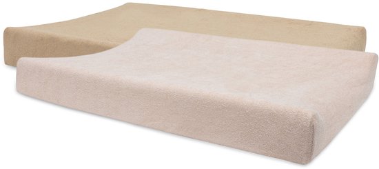 Twee beige badstof aankleedkussens naast elkaar.
