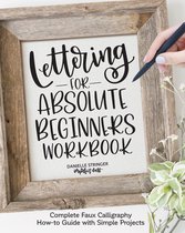 Omslag van 'Lettering for Absolute Beginners Workbook' in een houten lijst. Bevat sierlijke tekst met de titel en "DANIELLE STRINGER imperfect dust".