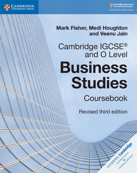 Cambridge IGCSE en O Level Business Studies Coursebook, herziene derde editie, met een gebouw op de achtergrond.
