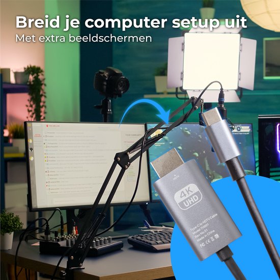 USB-C naar HDMI kabel wordt gebruikt om een computer aan te sluiten op een extra beeldscherm. De kabel is zilverkleurig met 4K UHD logo.