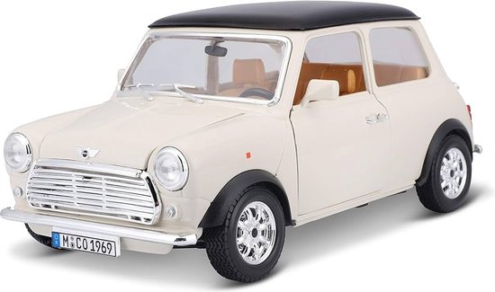 Crèmekleurige Mini Cooper 1969 met chromen grille, zwart dak en beige interieur.