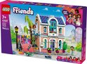 LEGO Friends Liann's Familiehuis doos met roze huis, skateboardbaan en zes poppetjes.