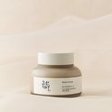 Pot met de 'Ground Rice and Honey Glow Mask' van Beauty of Joseon, op een zacht beige achtergrond.