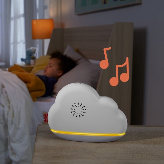 Witte muziekdoos in de vorm van een wolk met muzieknoten en een baby op de achtergrond.