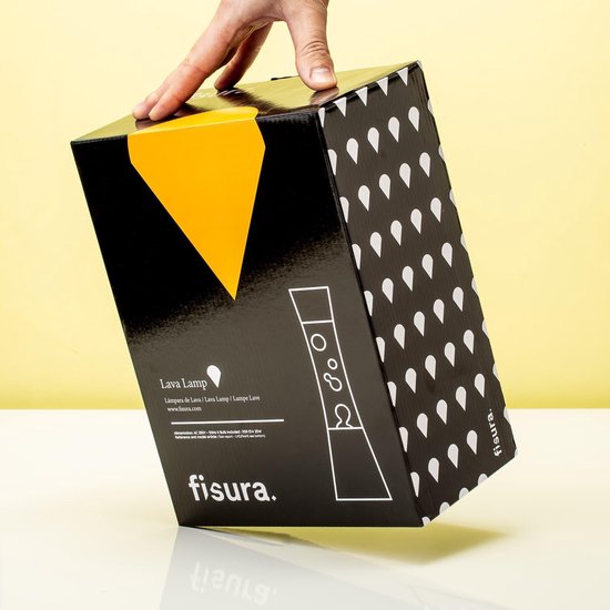 Een hand houdt de zwart-geel gestreepte verpakking van een Fisura lavalamp vast.