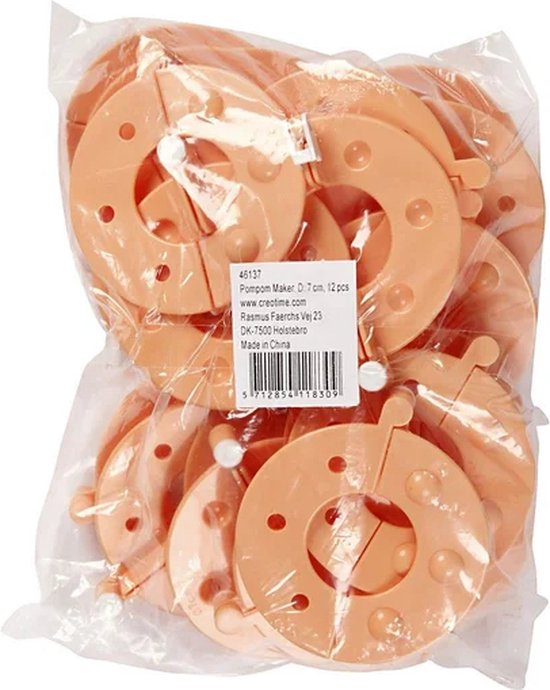 Een doorzichtige plastic verpakking met perzikkleurige pomponmakers, met productinformatie.