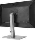 Achterkant van een ASUS ProArt monitor met diverse aansluitingen en zilverkleurige standaard.