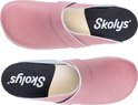 Paar pastelroze Skolys klompen, bovenaanzicht. Zwarte binnenzool met Skolys logo.