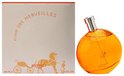 Elixir des Merveilles Eau de Parfum, 100 ml (3.3 FL.OZ). Doos met koets en parfumflesje, beige en oranje.