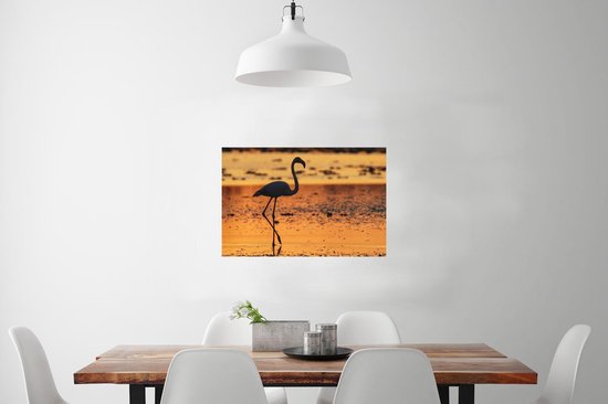 Poster Het silhouet van een flamingo bij zonsondergang - 60x40 cm