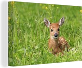 Canvas Schilderij Hert - Gras - Bloemen - 30x20 cm - Wanddecoratie
