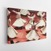 Canvas schilderij - Semazen or Whirling Dervishes, Konya. Sufi whirling dervish (Semazen) dances at . Semazen conveys God's spiritual gift to those are witnessing the ritual.  -