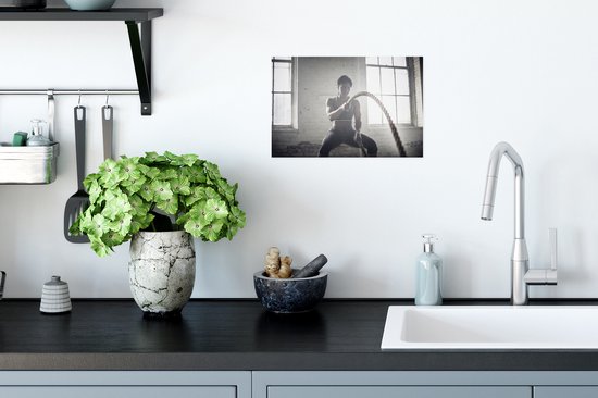 Affiche - Une femme s'entraine avec deux cordes - 30x20 cm