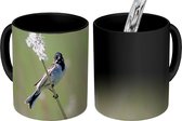 Magische Mok - Foto op Warmte Mok - Een rietgors bevindt zich in wuivend riet - 350 ML