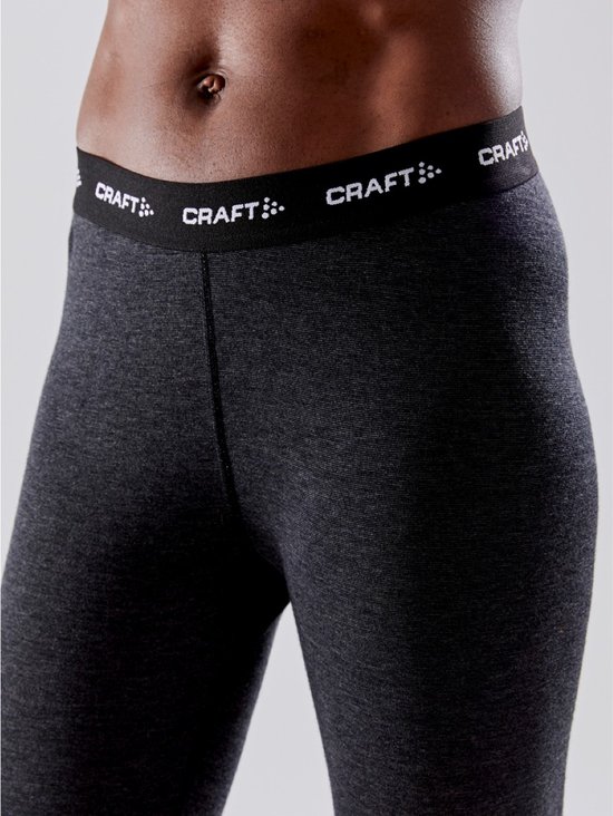 Donkergrijze thermolegging met zwarte tailleband met 'CRAFT' logo.